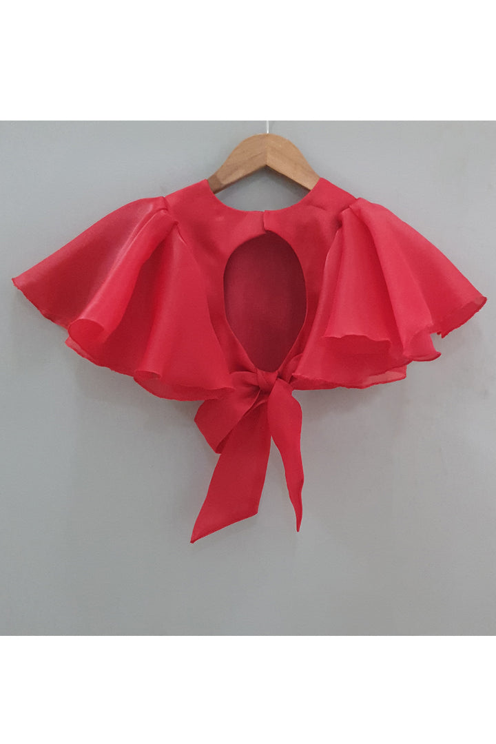 Red frilly sleeves top and printed lehenga with a sling bag