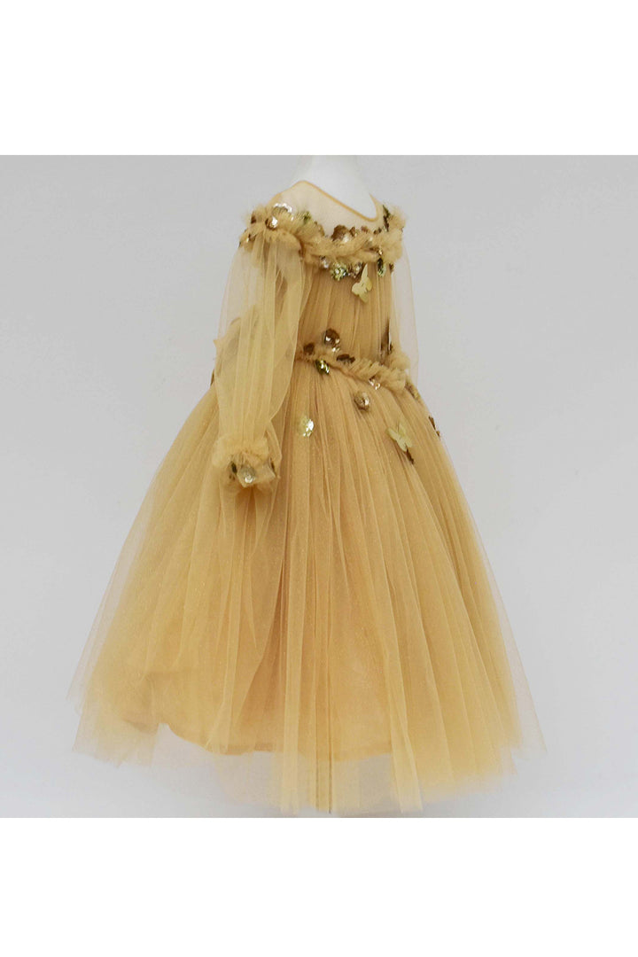 Golden glitter gown with flowers and butterflies