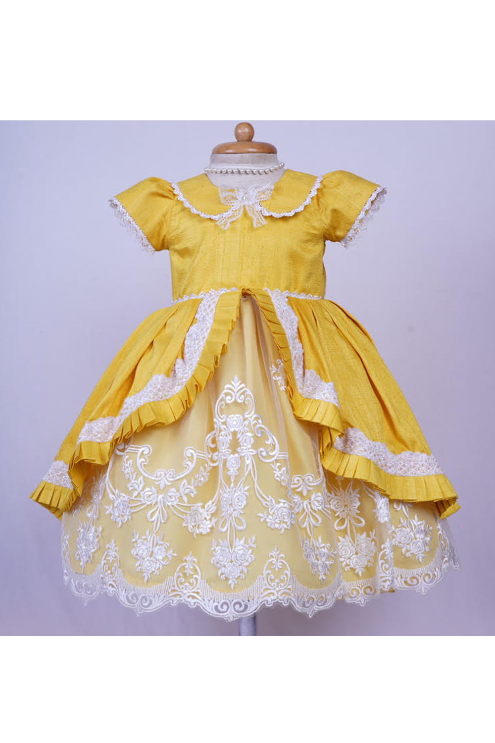 Shop from our latest designer collection of kids gowns. Customised children's designer gowns are made to measurements. Worldwide delivery. Free Shipping*