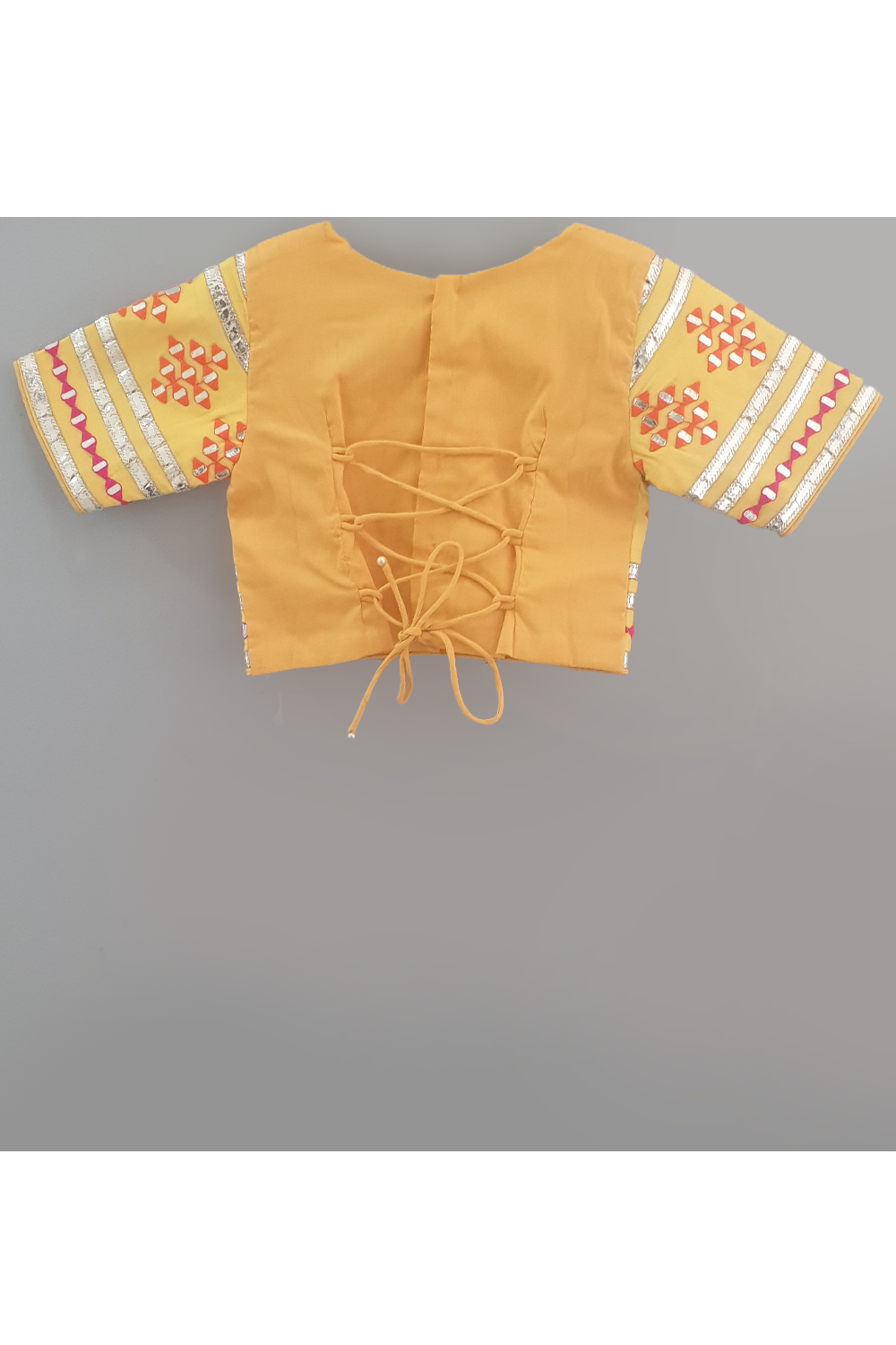 Mango yellow embroidered choli and lehenga with frilly dupatta
