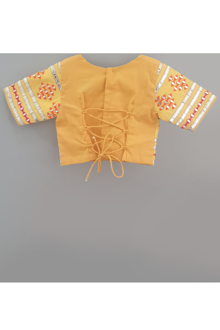 Mango yellow embroidered choli and lehenga with frilly dupatta