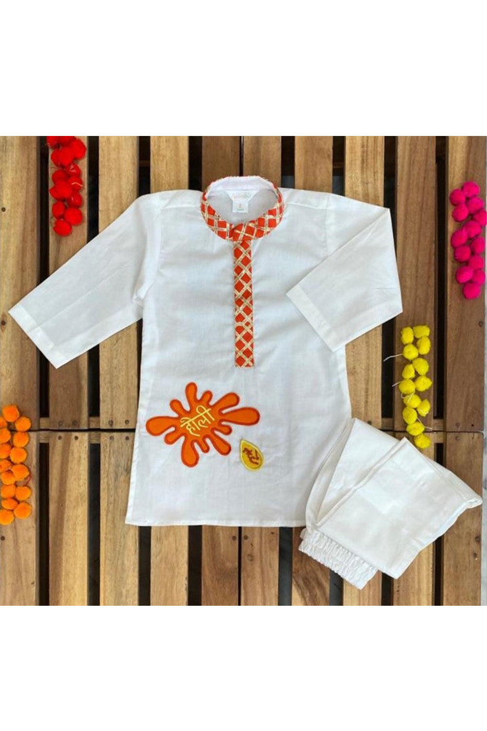 Off white kurta with holi hai patch work and pyjama