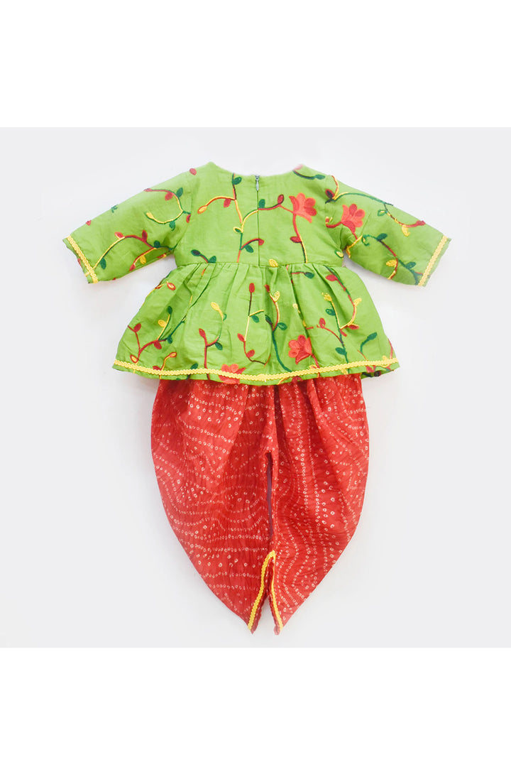 Green floral embroidered peplum style top with red dhoti