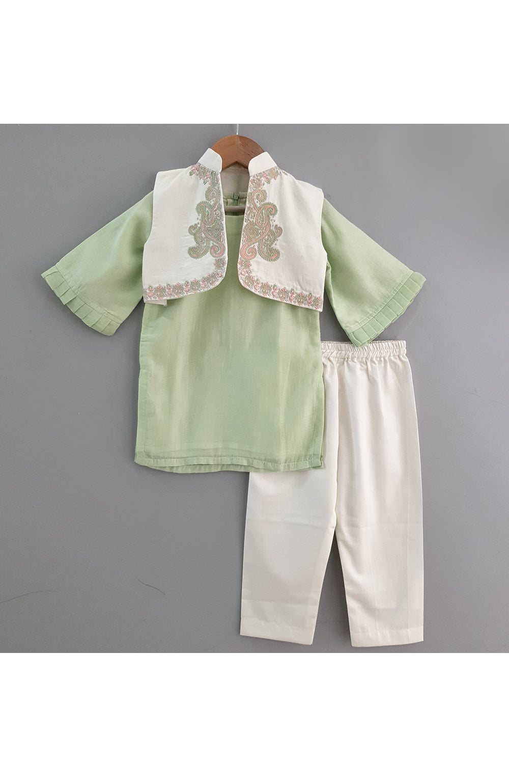 Light green kurta and straight pyjama with embroidered jacket
