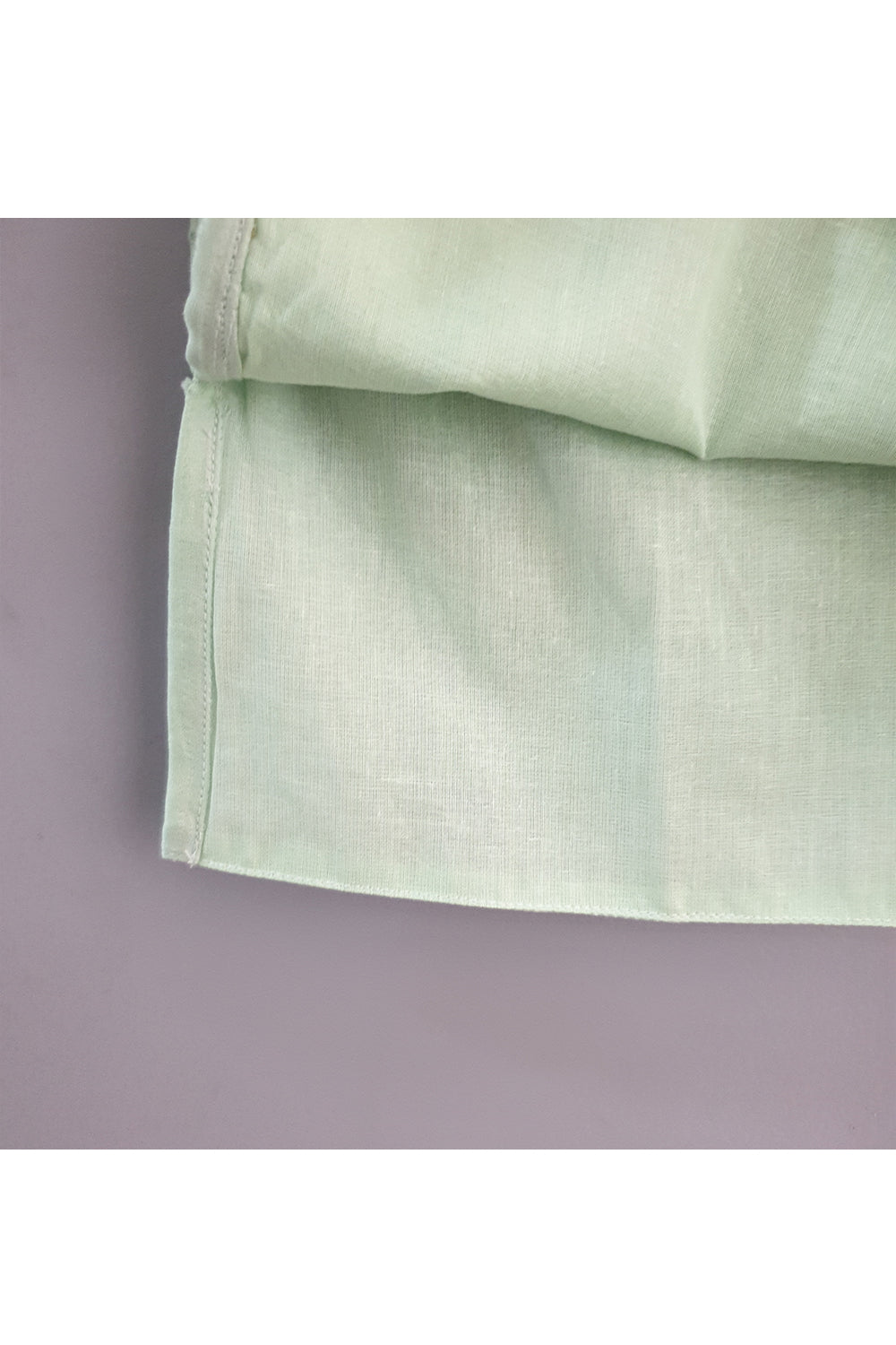 Light green kurta and pyjama with embroidered jacket